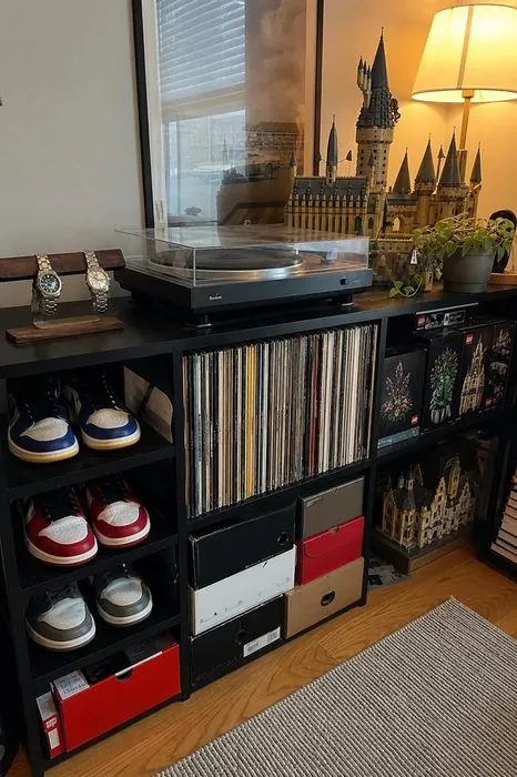 A collector's shelf with sneakers, records and LEGO